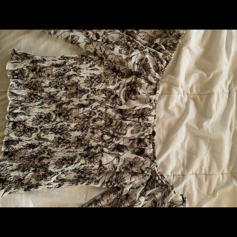 Black and white floral off-the-shoulder top.